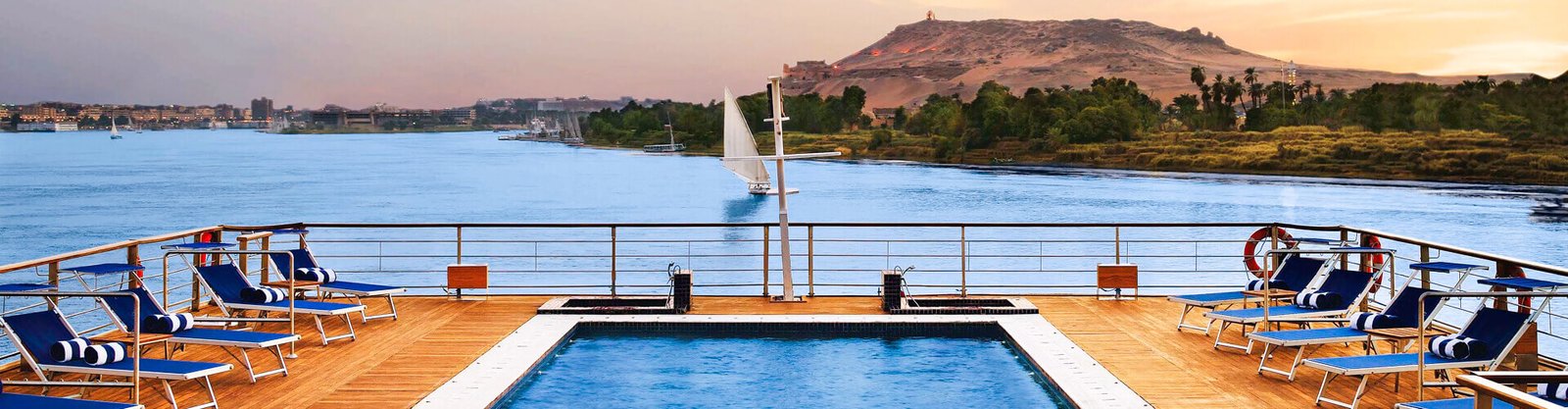 a beautiful scene during sunset from inside a nile cruise in egypt