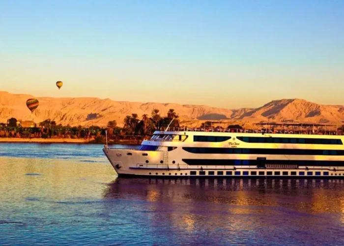 A luxury cabin overlooking the river, showcasing what is included in a Nile cruise accommodation package