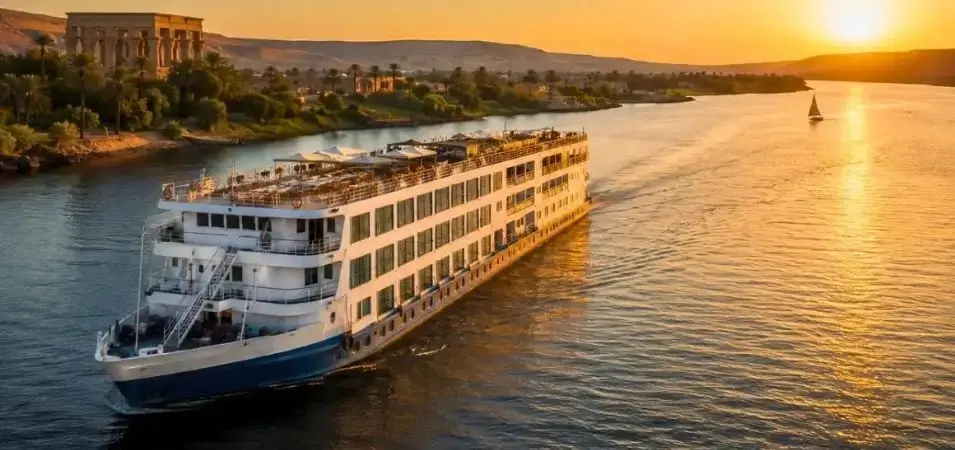 Nile Cruise Cost 2026: Prices by Ship Type & Route 1 A luxury egypt nile cruise ship sailing at sunset
